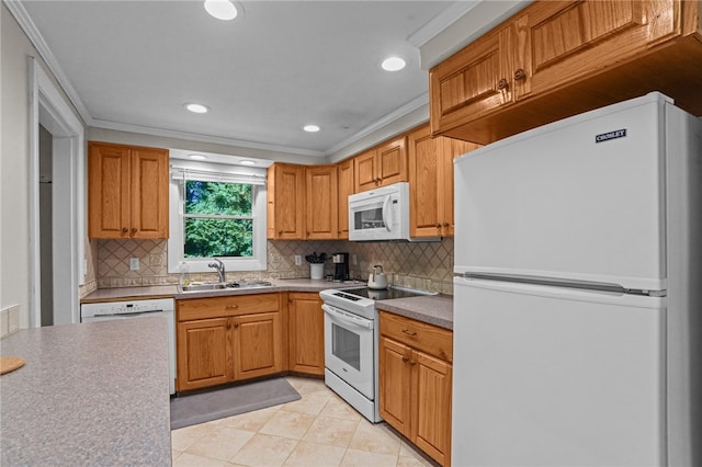 kitchen with tasteful backsplash, white appliances, sink, and crown molding