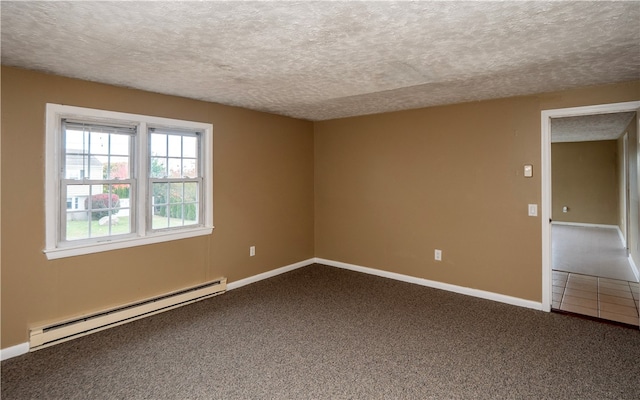 unfurnished room with a baseboard radiator, carpet flooring, and a textured ceiling