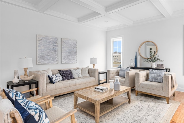 living room with light hardwood / wood-style floors, beamed ceiling, crown molding, and coffered ceiling