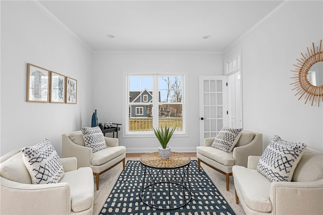 living room featuring hardwood / wood-style flooring and ornamental molding