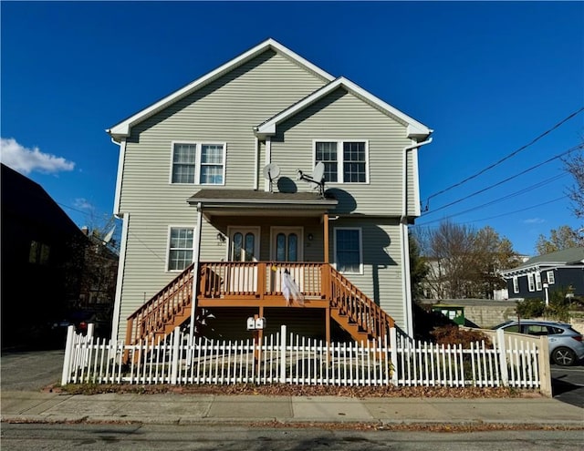 21 Grant St, Providence, RI 02909 - view of front facade with stairs, covered porch, and a fenced front yard