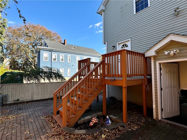 wooden deck with a patio area