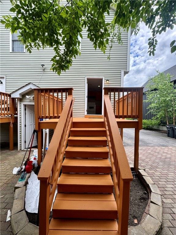 exterior space featuring a patio area and a wooden deck