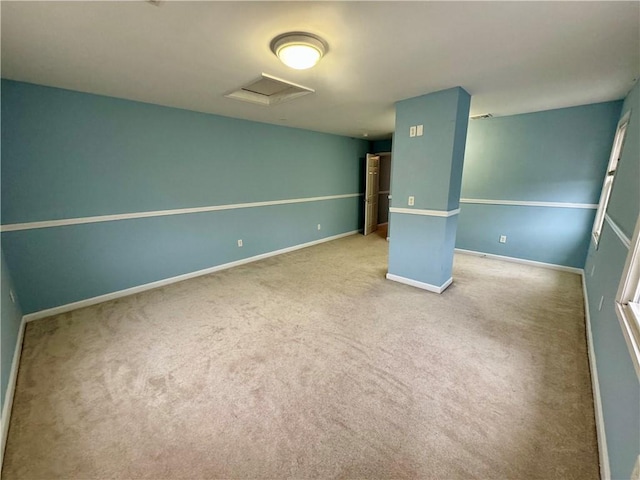 21 Grant St, Providence, RI 02909 - carpeted empty room with baseboards and attic access