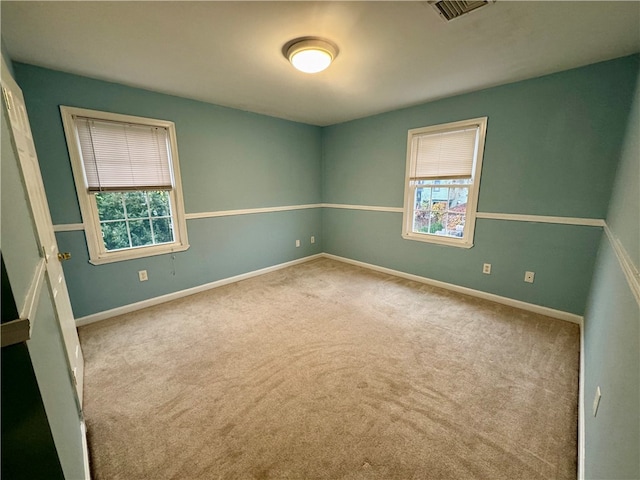 spare room with carpet flooring