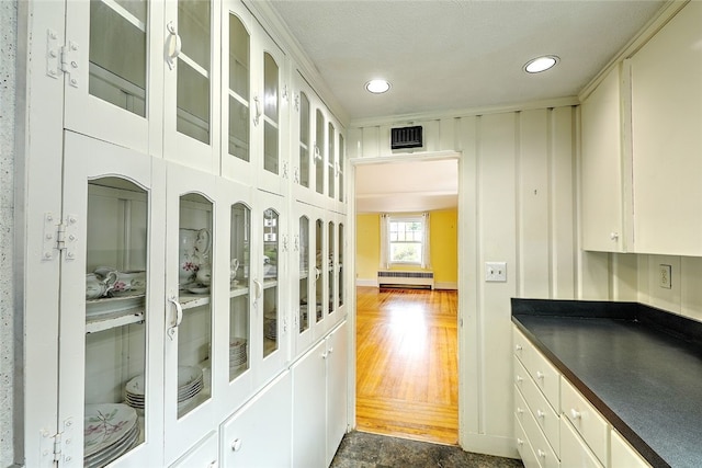 hall with dark hardwood / wood-style floors