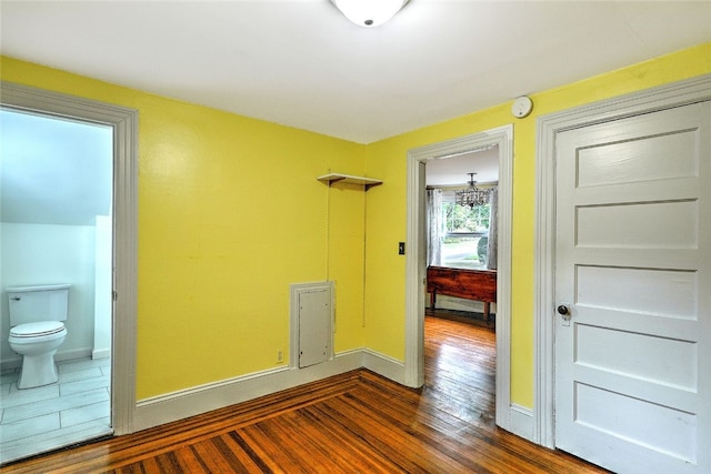 interior space with dark hardwood / wood-style flooring