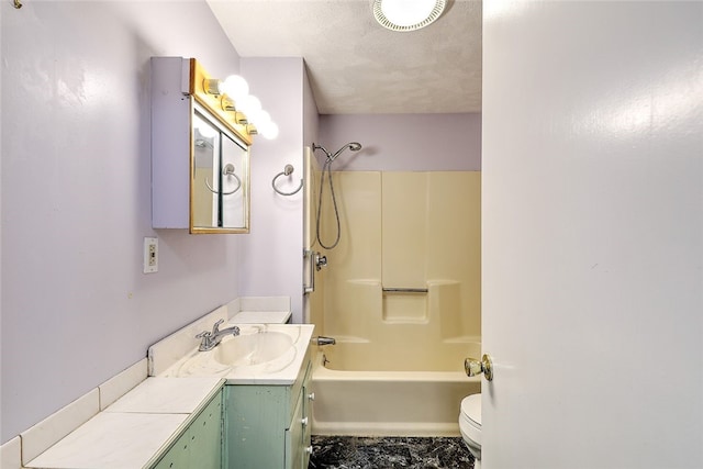 full bathroom with vanity, toilet, a textured ceiling, and bathtub / shower combination