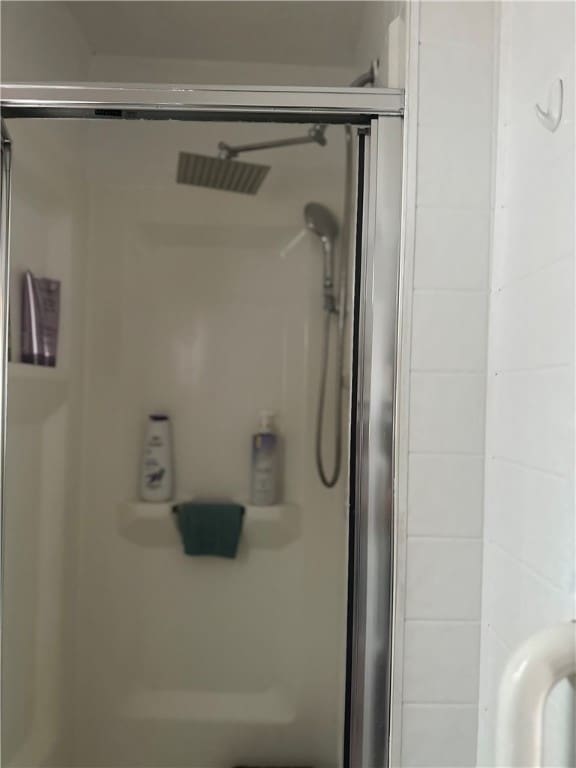 bathroom with an enclosed shower