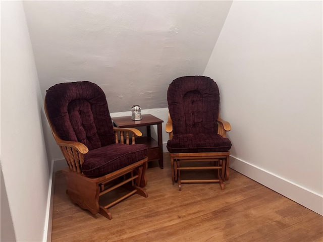 sitting room with light hardwood / wood-style flooring