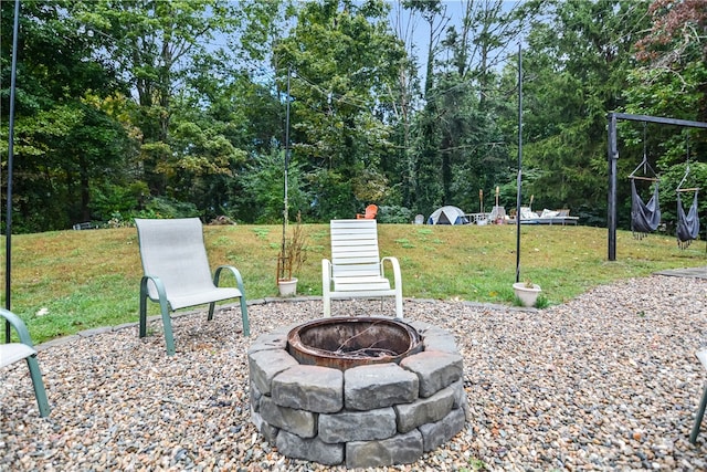 view of patio featuring a fire pit