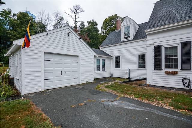 exterior space with a garage