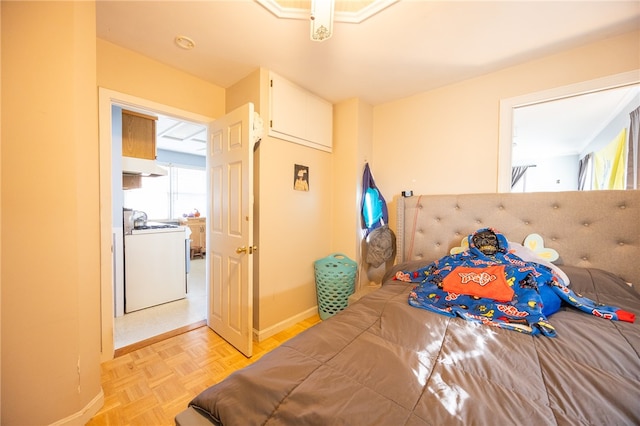 bedroom featuring light parquet flooring