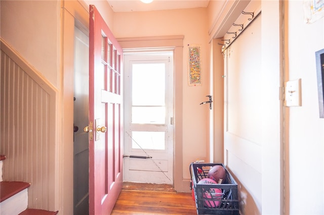 hall with wood-type flooring