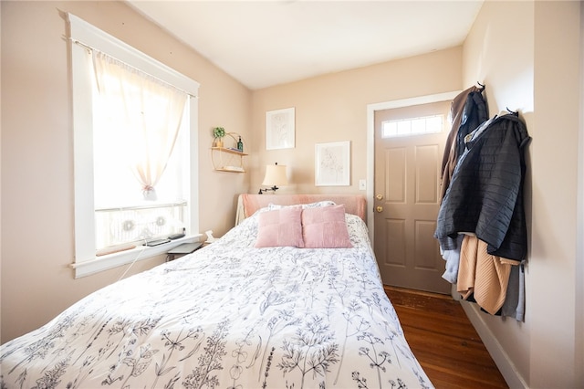 bedroom with wood-type flooring