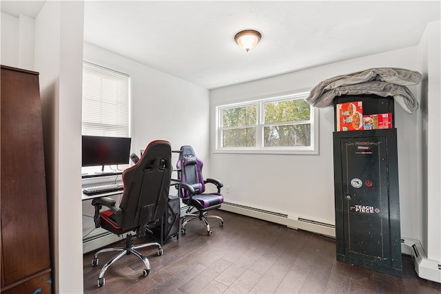 office area with dark hardwood / wood-style floors and a baseboard radiator