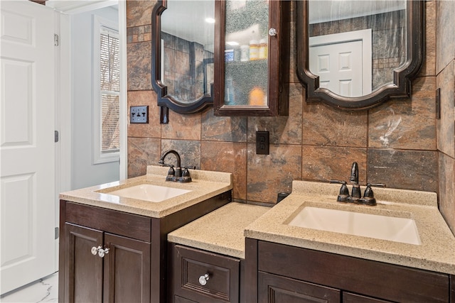 bathroom featuring decorative backsplash and vanity