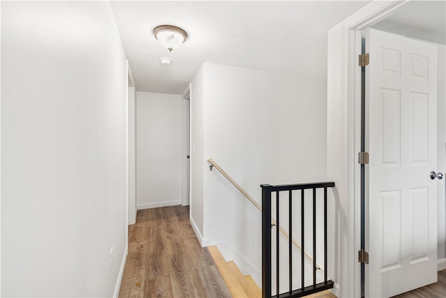 hallway featuring hardwood / wood-style flooring