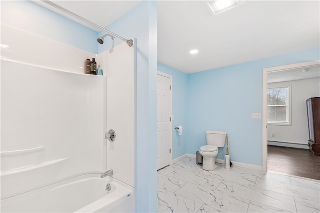 bathroom featuring toilet, bathing tub / shower combination, hardwood / wood-style flooring, and baseboard heating