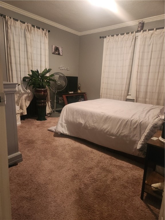 carpeted bedroom featuring ornamental molding