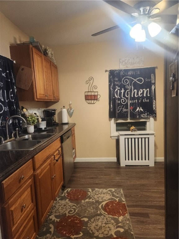 kitchen with dishwasher, ceiling fan, dark hardwood / wood-style flooring, and sink