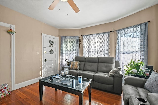 living room with hardwood / wood-style flooring and ceiling fan