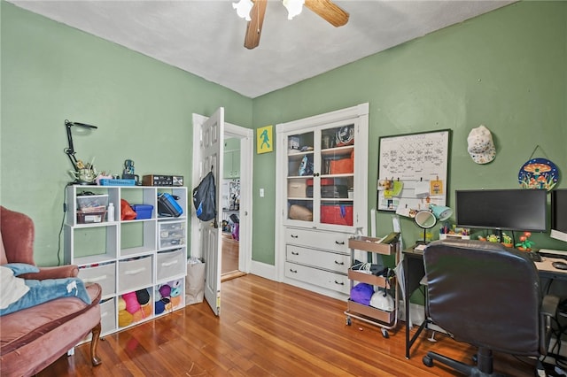 office area with hardwood / wood-style flooring and ceiling fan