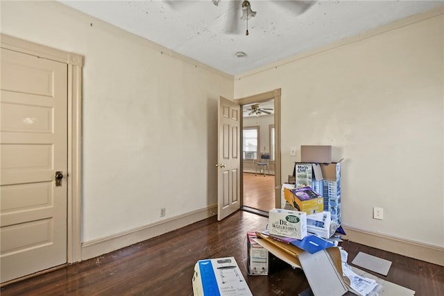 miscellaneous room with dark wood-type flooring and ceiling fan