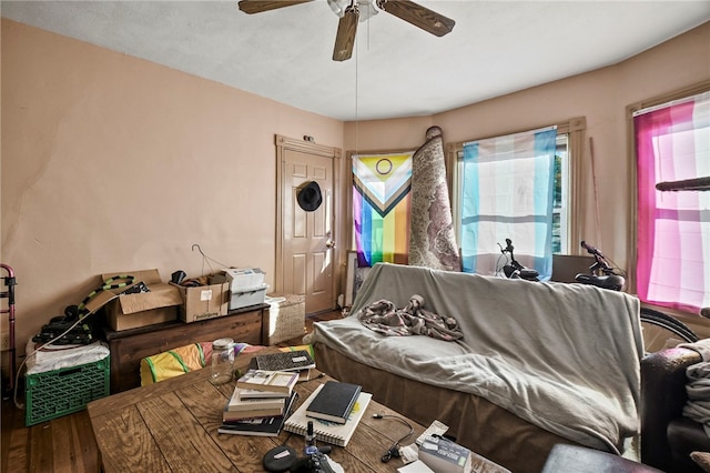 interior space with hardwood / wood-style flooring and ceiling fan