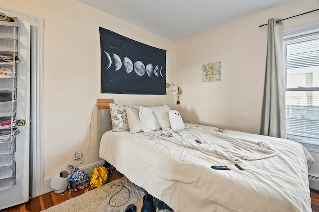 bedroom featuring dark wood-type flooring