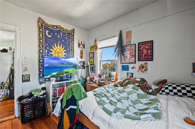 bedroom with wood-type flooring