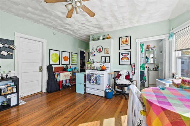 bedroom featuring dark hardwood / wood-style floors and ceiling fan