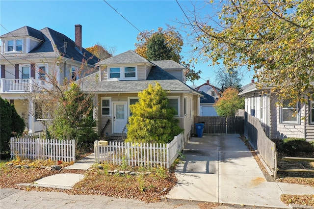 view of front of house featuring a balcony