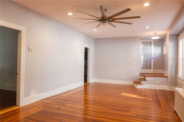 interior space featuring hardwood / wood-style flooring and ceiling fan