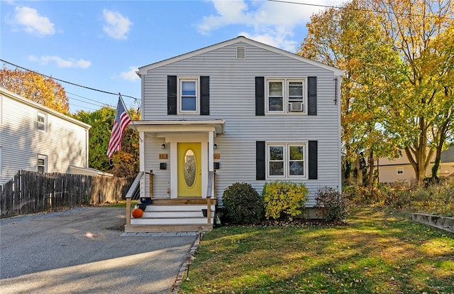 front of property featuring a front lawn