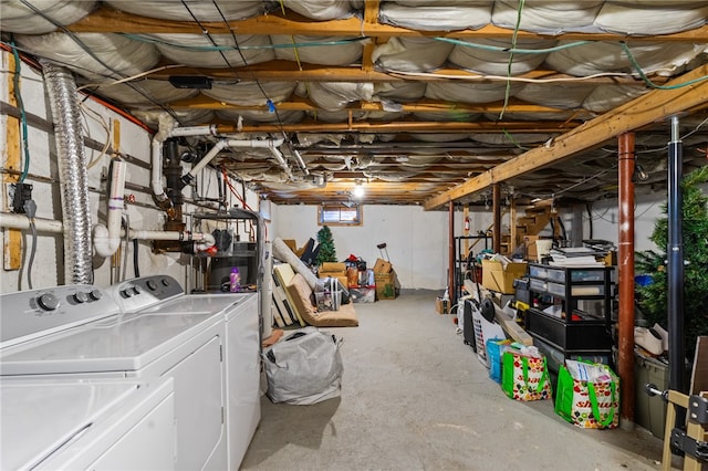 basement with washing machine and dryer