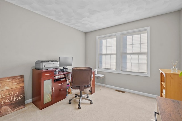 view of carpeted office space