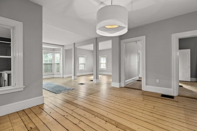 unfurnished room with light hardwood / wood-style flooring