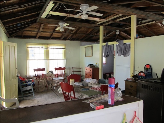 dining space with lofted ceiling and ceiling fan