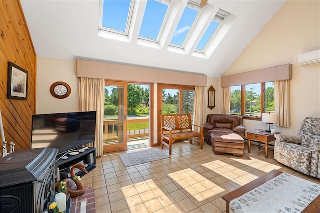 sunroom featuring lofted ceiling with skylight, plenty of natural light, a wall mounted air conditioner, and a baseboard heating unit