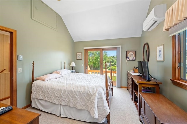 carpeted bedroom featuring a wall mounted air conditioner, access to outside, and vaulted ceiling