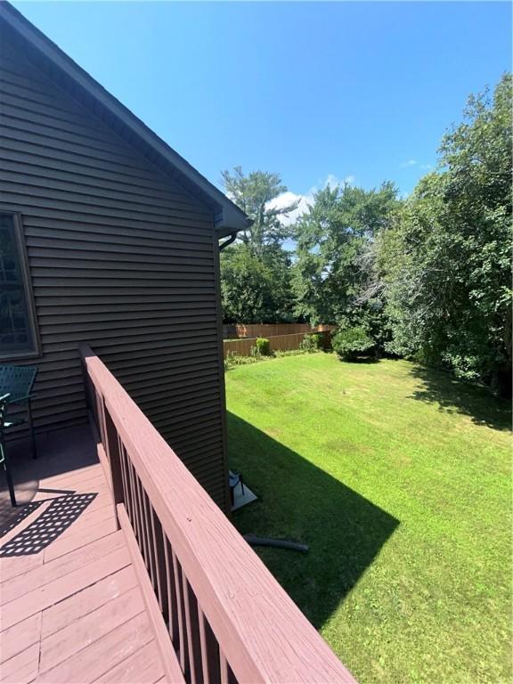 deck featuring a lawn