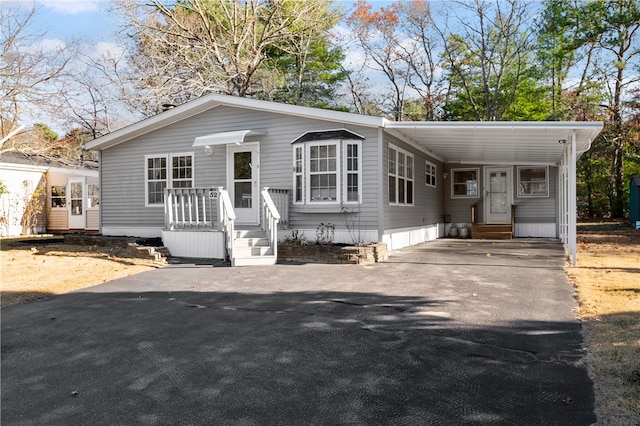 view of front facade featuring a carport