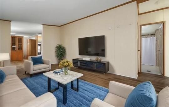 living room with crown molding and wood-type flooring