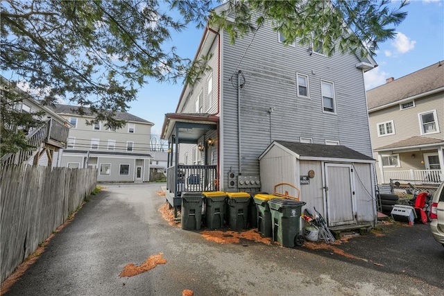 exterior space with a shed