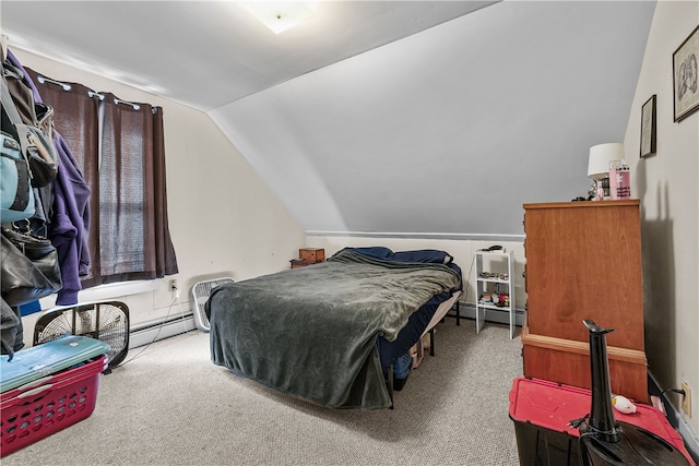 bedroom featuring carpet flooring, a baseboard heating unit, and vaulted ceiling