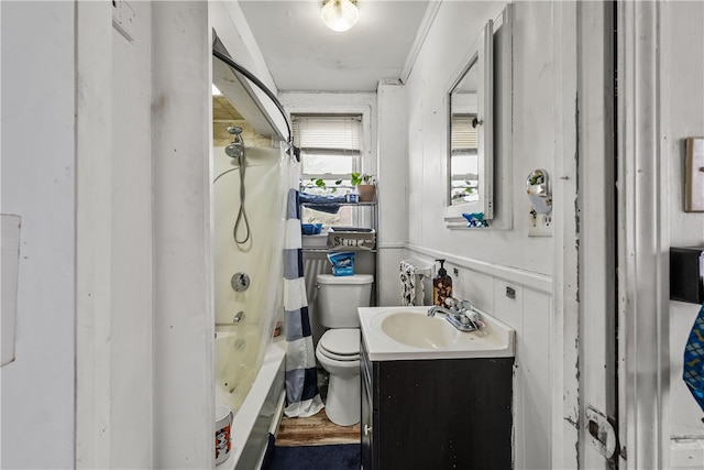 full bathroom with vanity, shower / bath combination with curtain, and toilet