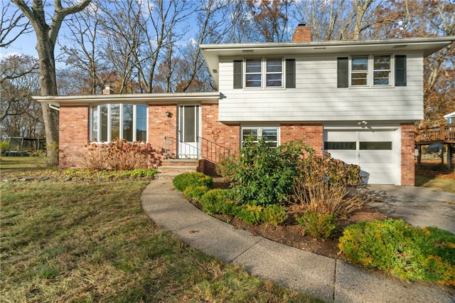 split level home with a garage