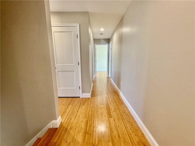 hallway featuring light hardwood / wood-style flooring