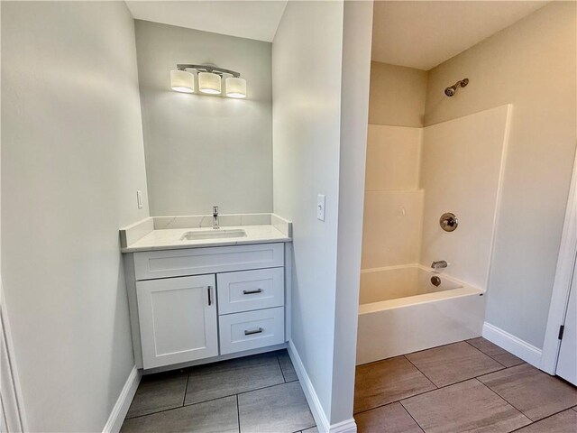 bathroom with vanity and shower / bathtub combination